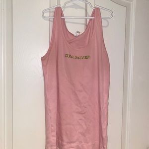 Light pink tank top with boat on the back